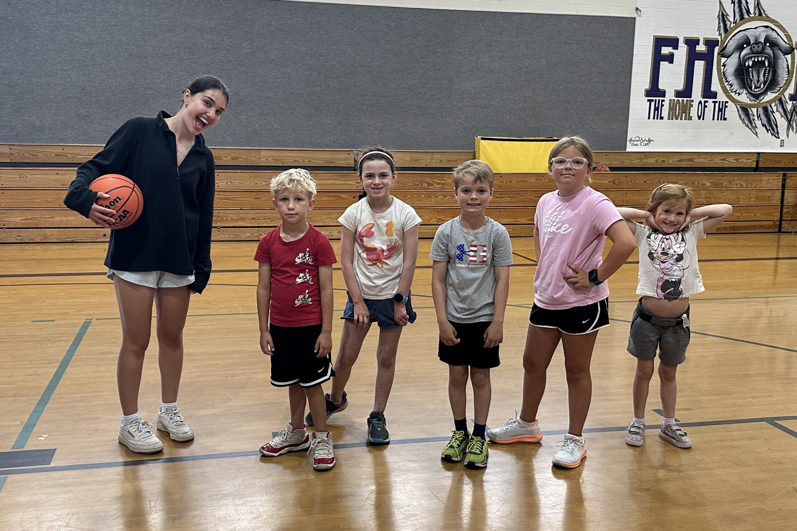Basketball Camp (52) basketball coach and kids during summer camp
