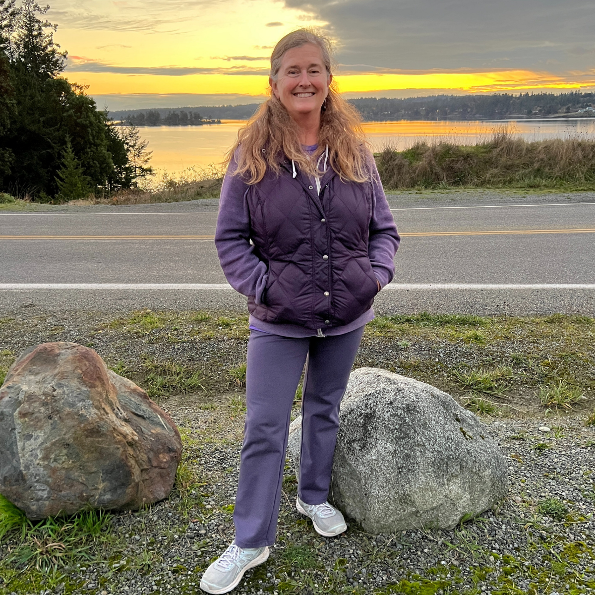 woman with ocean in the background