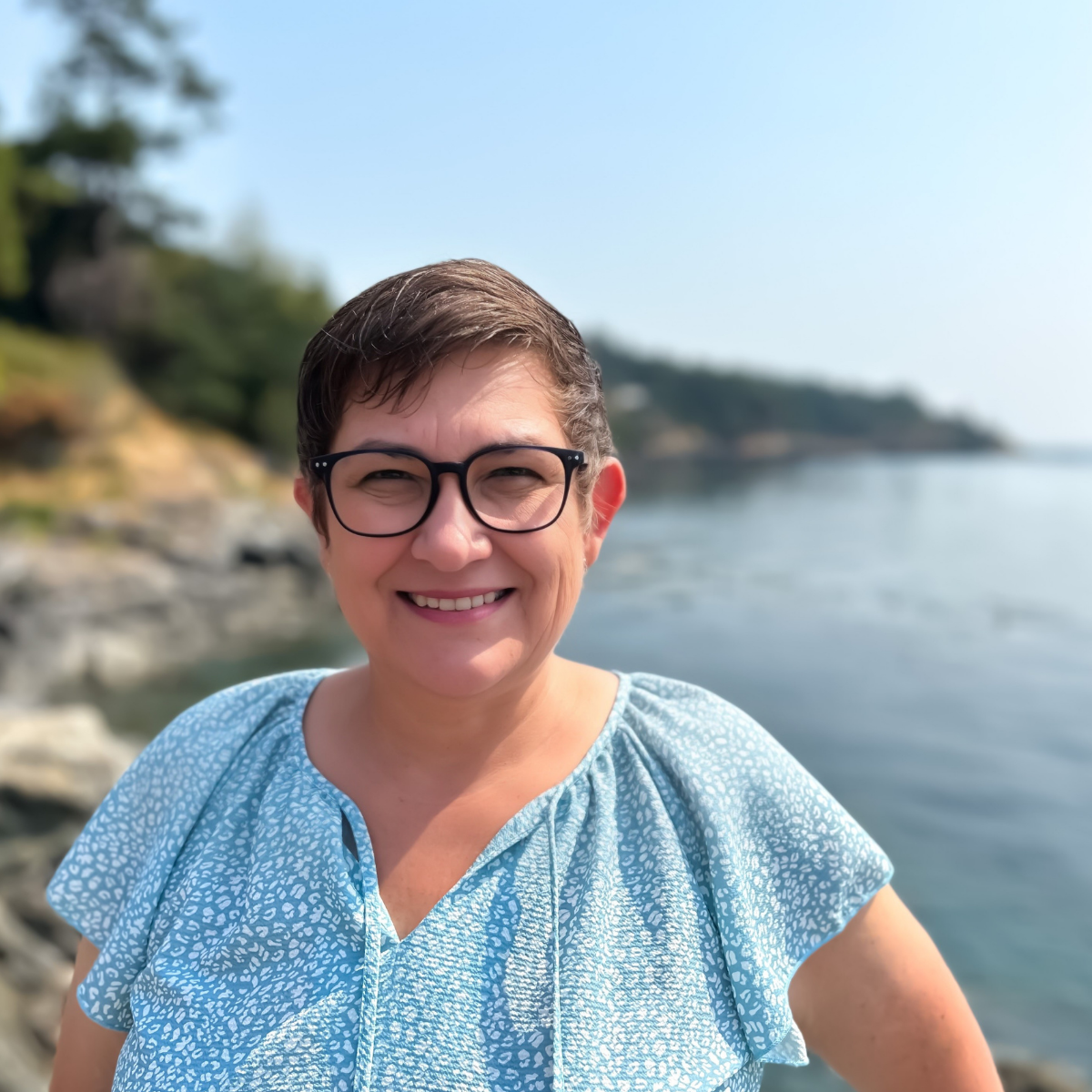 woman with ocean in the background